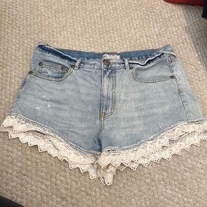 Free people light wash denim white lace shorts